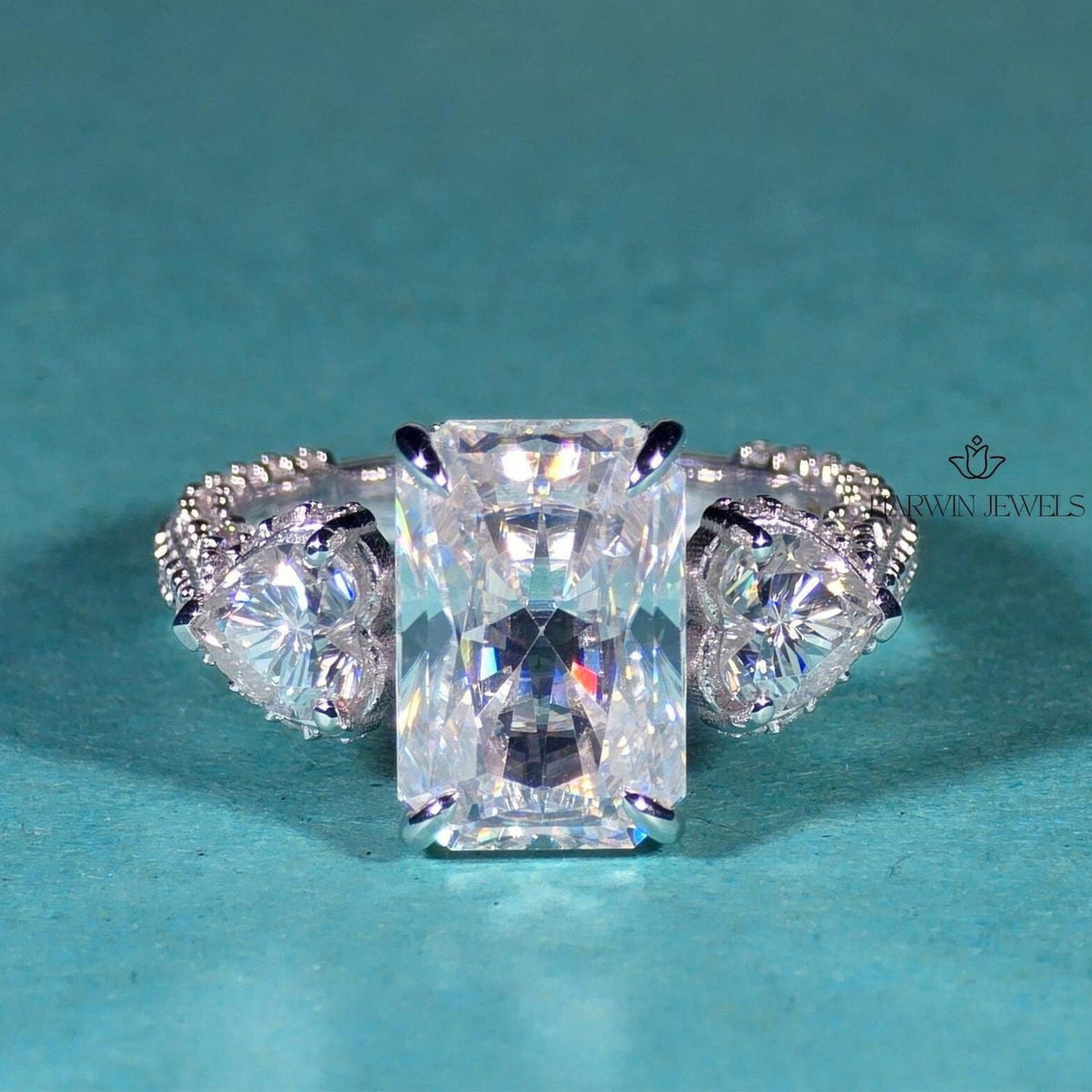 4.50 CT Radiant Cut Side Stone Heart Moissanite Three Stone Ring, Pave Setting Band