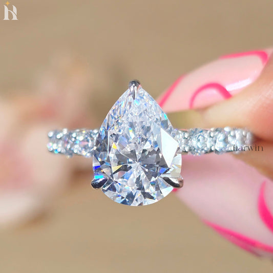 3.5 CT Pear Cut Moissanite Hidden Halo Ring and Round Cut Pave Set Band